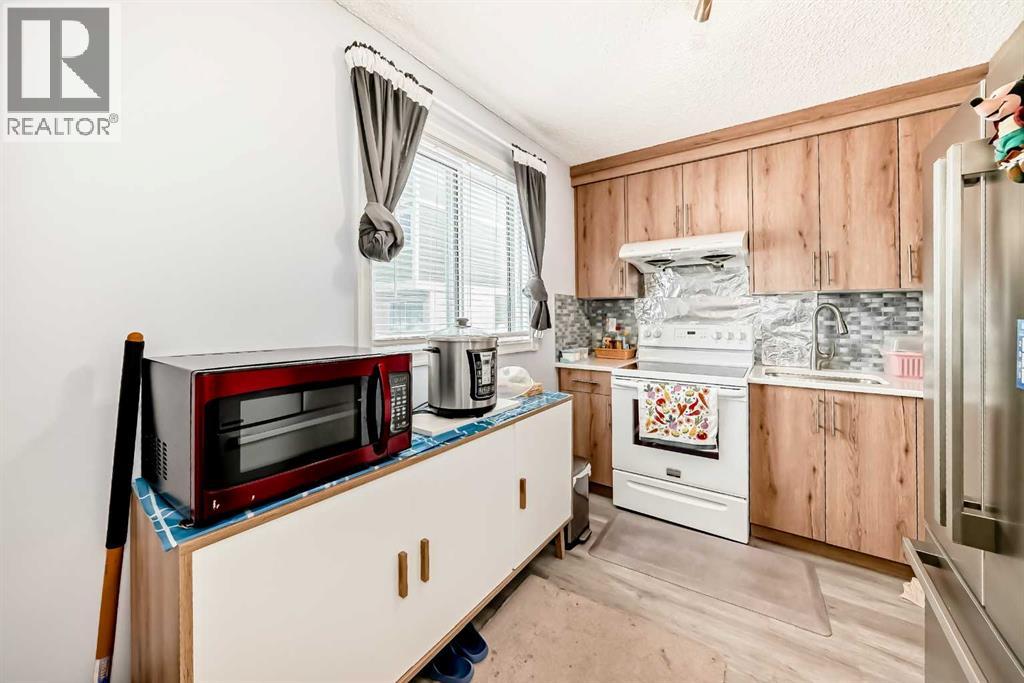 103, 405 64 Avenue Ne, Calgary, Alberta  T2K 6J6 - Photo 8 - A2306187