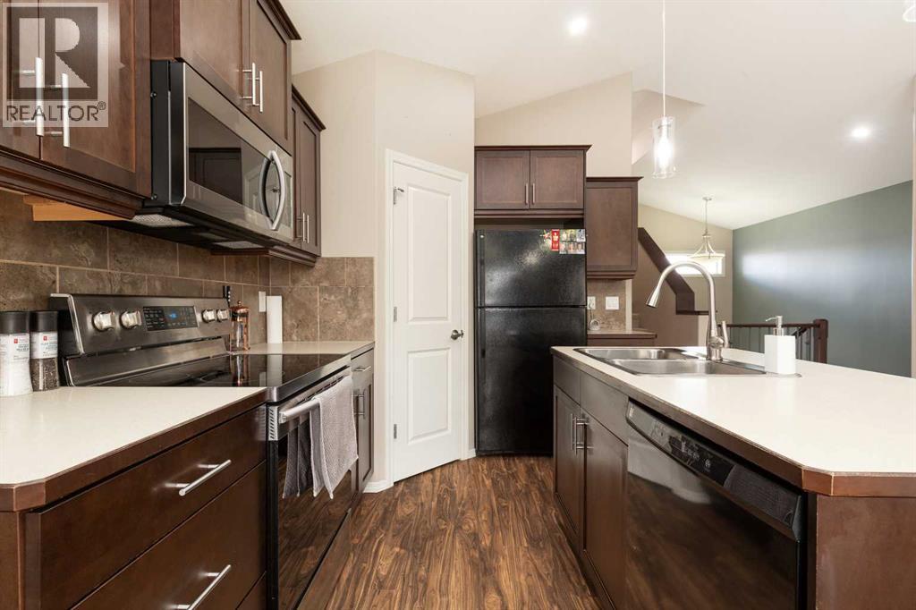 719 Silkstone Close W, Lethbridge, Alberta  T1J 4B9 - Photo 7 - A2306570