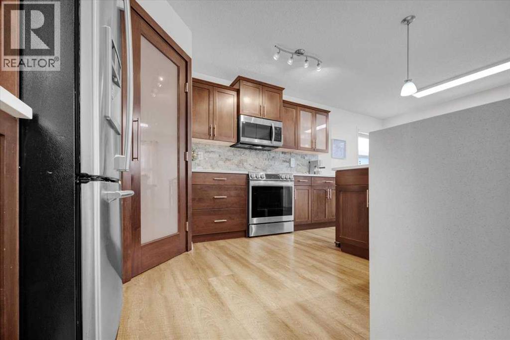 1009 Channelside Way Sw, Airdrie, Alberta  T4B 3H9 - Photo 16 - A2303627