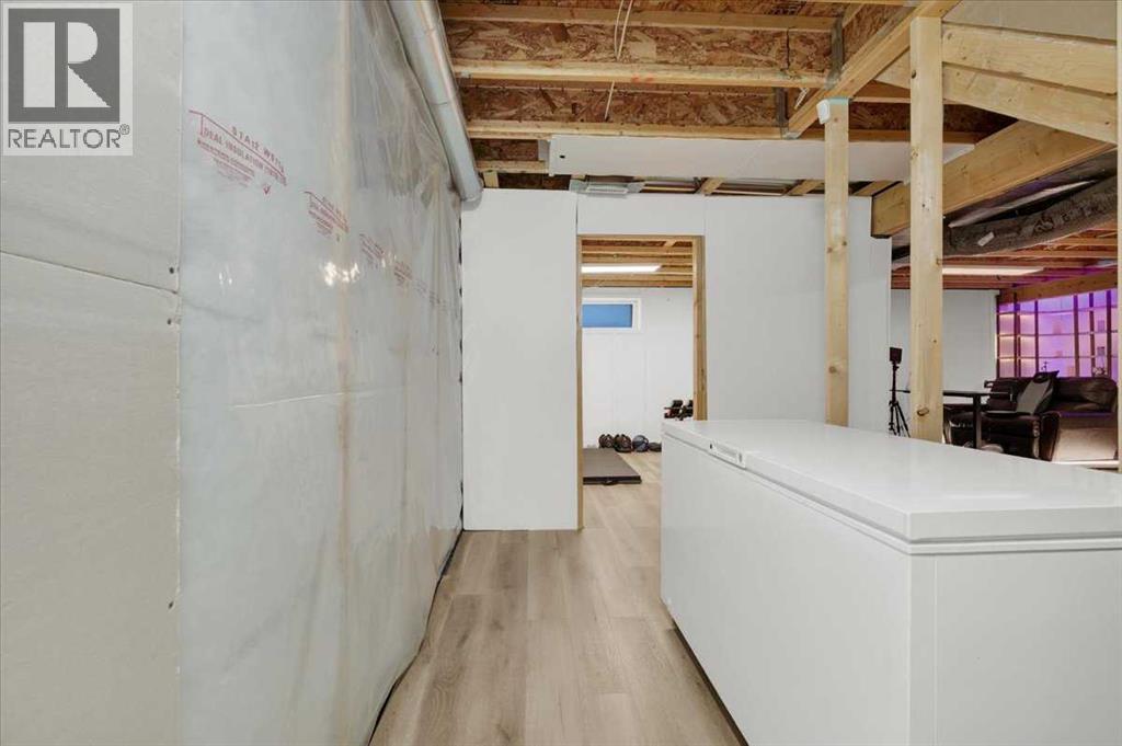 1009 Channelside Way Sw, Airdrie, Alberta  T4B 3H9 - Photo 35 - A2303627