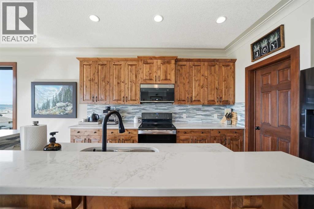 185 Sunset Circle, Cochrane, Alberta  T4C 0C5 - Photo 10 - A2300315