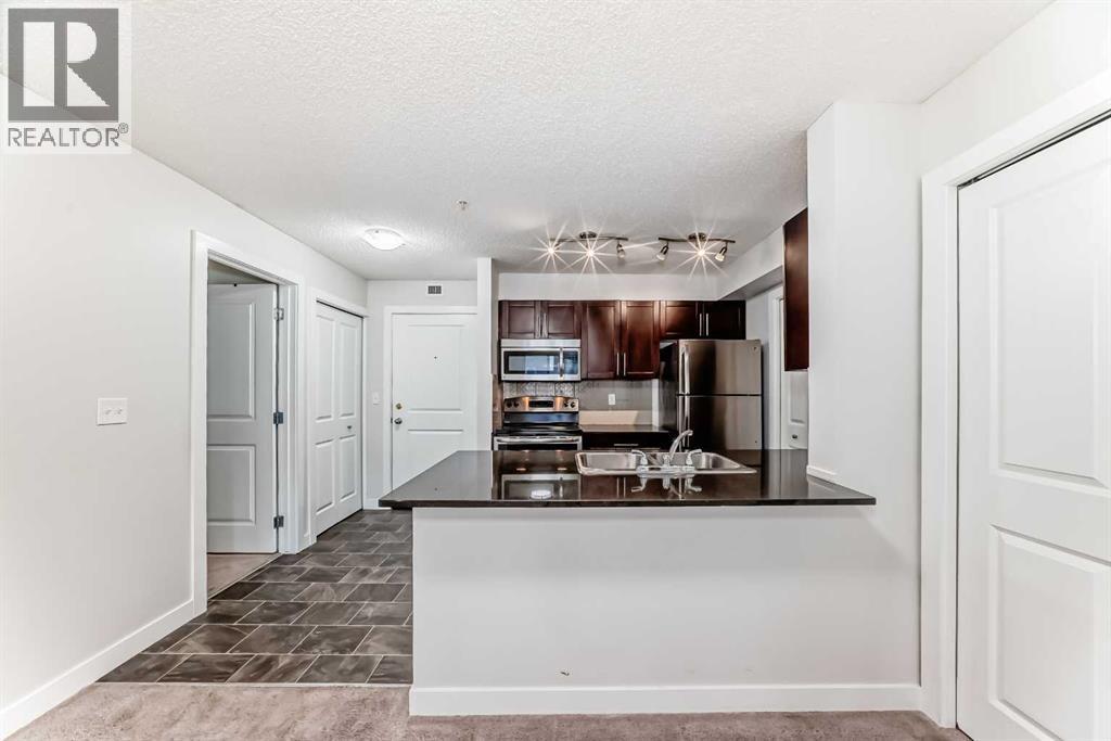 9309, 403 Mackenzie Way SW, Airdrie, Alberta  T4B 3V7 - Photo 5 - A2287947