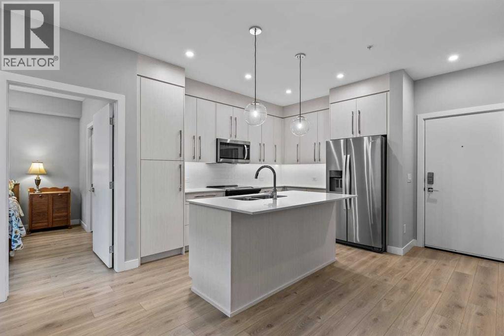 107, 383 Smith Street NW, Calgary, Alberta  T3B 6J9 - Photo 5 - A2283380