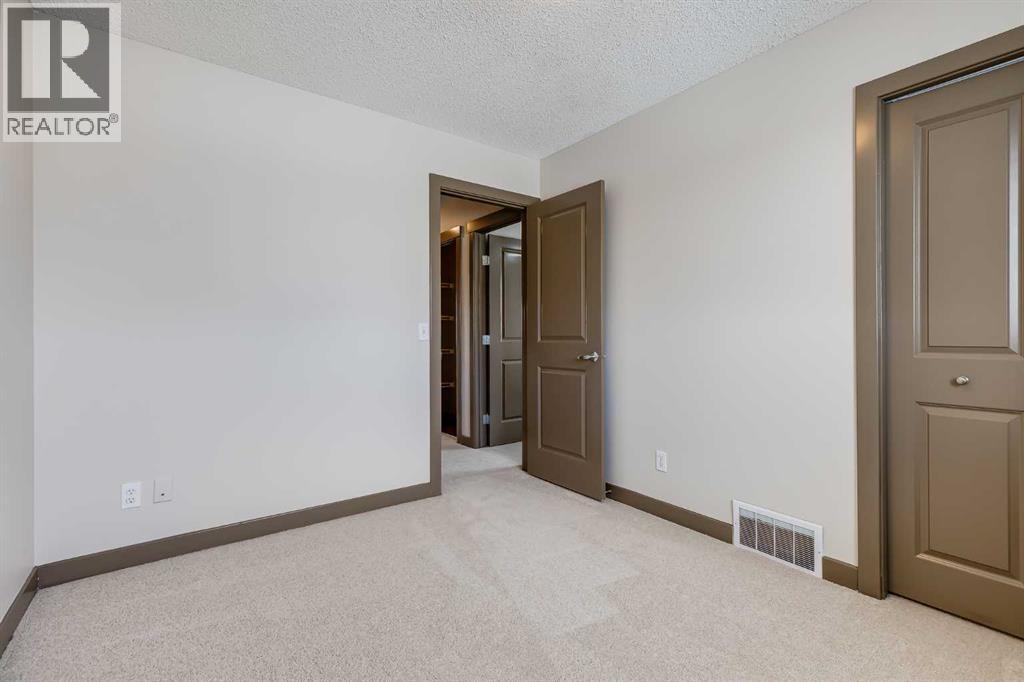 106 Luxstone Way SW, Airdrie, Alberta  T4B 0H6 - Photo 16 - A2290938