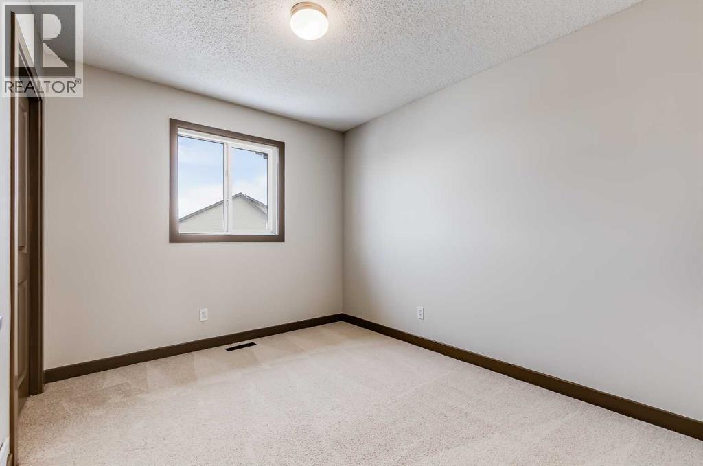 106 Luxstone Way SW, Airdrie, Alberta  T4B 0H6 - Photo 15 - A2290938