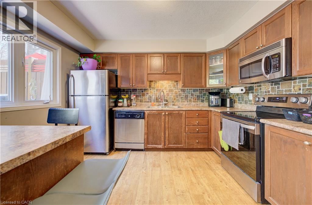110 Activa Avenue Unit# E34, Kitchener, Ontario  N2E 3T3 - Photo 5 - 40825552