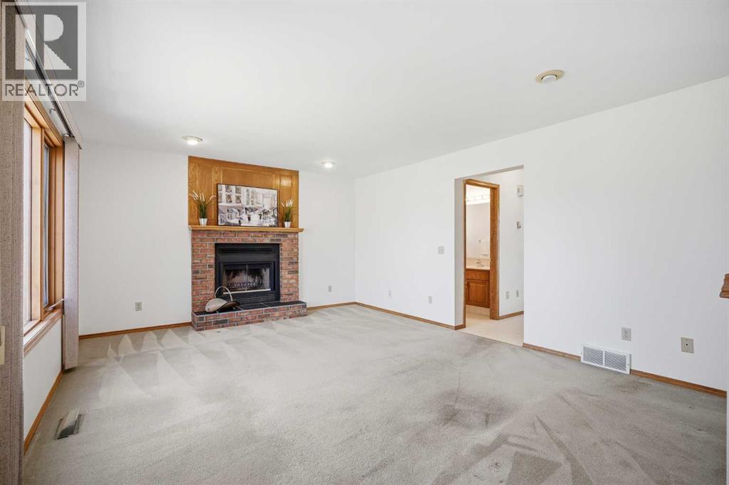 16 Macewan Ridge View Nw, Calgary, Alberta  T3K 3W2 - Photo 8 - A2305680