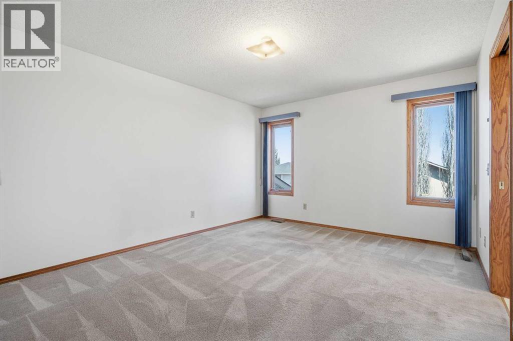 16 Macewan Ridge View Nw, Calgary, Alberta  T3K 3W2 - Photo 13 - A2305680