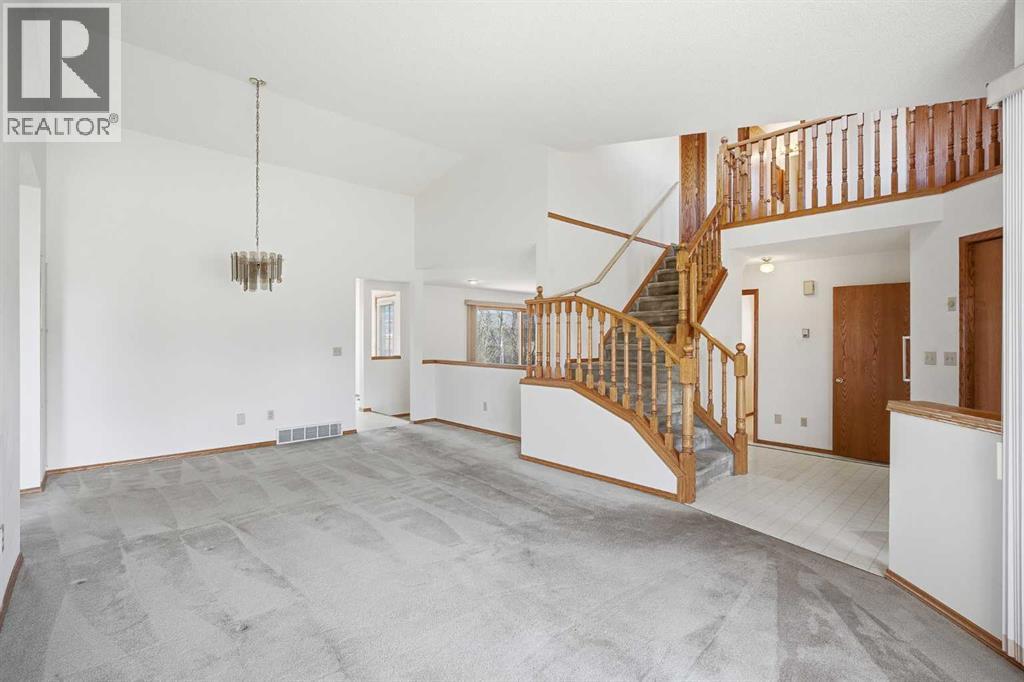 16 Macewan Ridge View Nw, Calgary, Alberta  T3K 3W2 - Photo 4 - A2305680