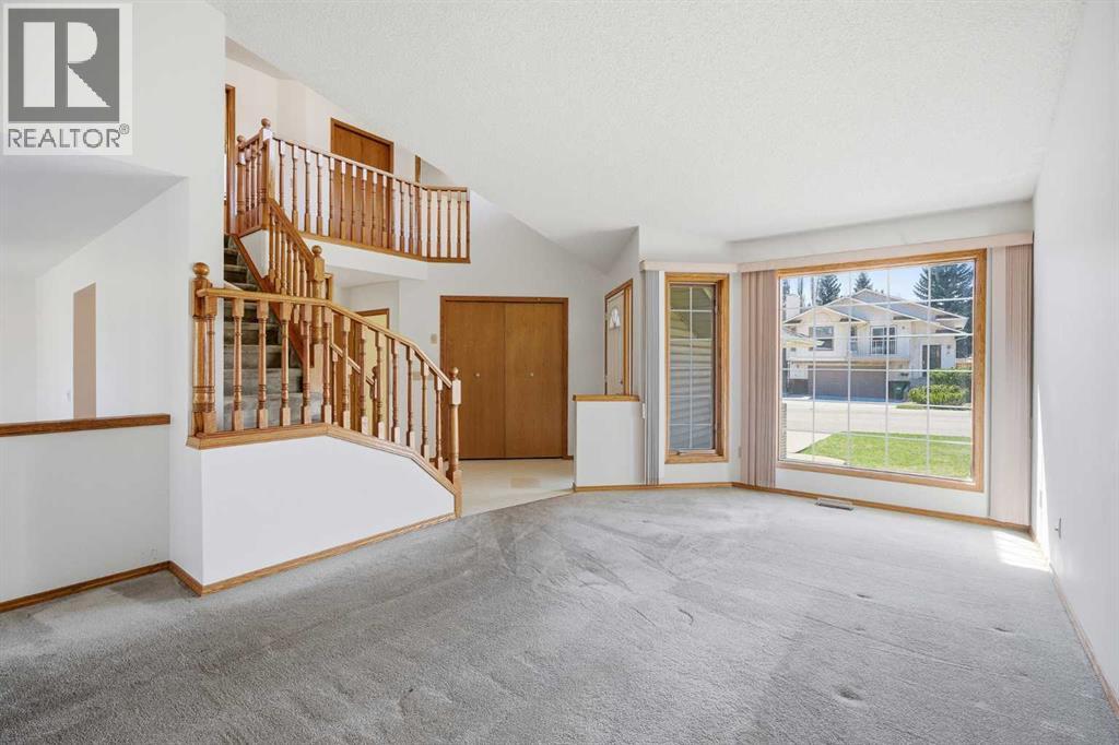 16 Macewan Ridge View Nw, Calgary, Alberta  T3K 3W2 - Photo 3 - A2305680