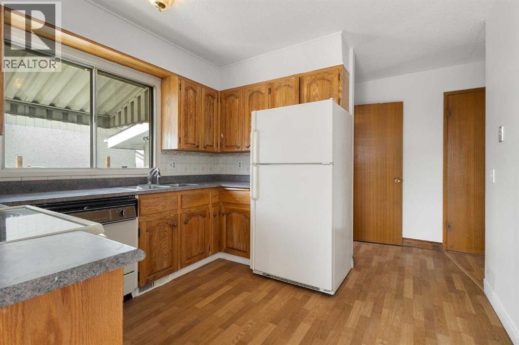 5216 Marian Road NE, Calgary, Alberta  T2A 2Y2 - Photo 5 - A2298591