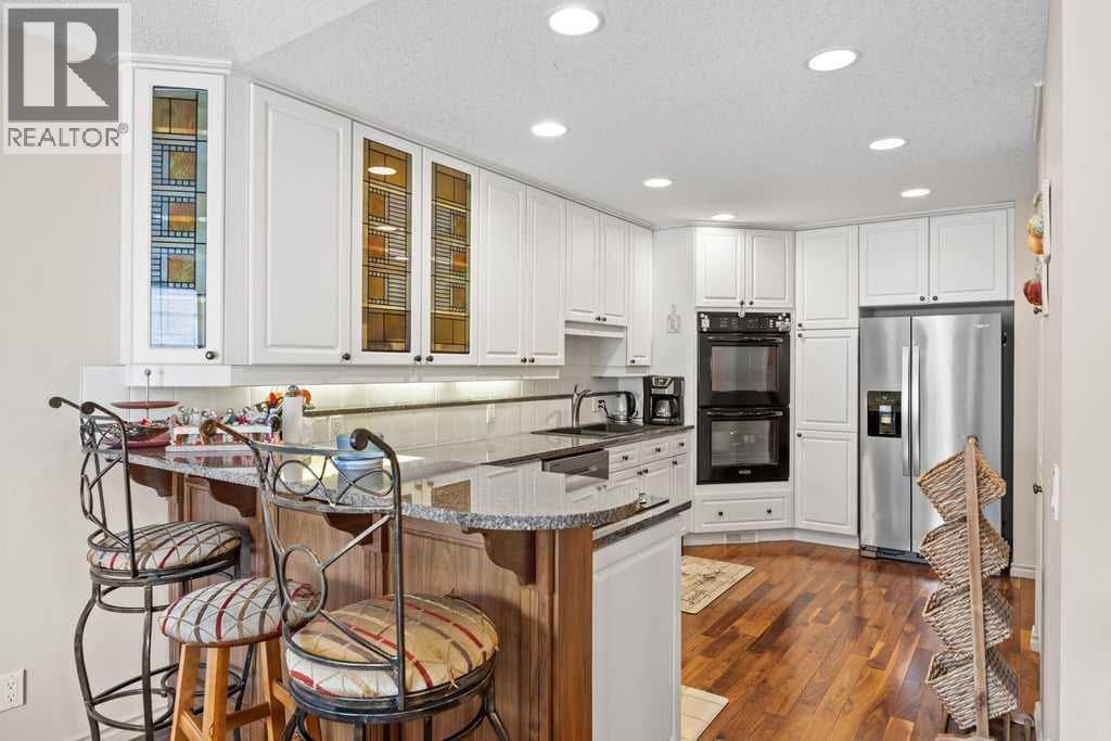 4 Prominence Path SW, Calgary, Alberta  T3H 2W7 - Photo 5 - A2306246