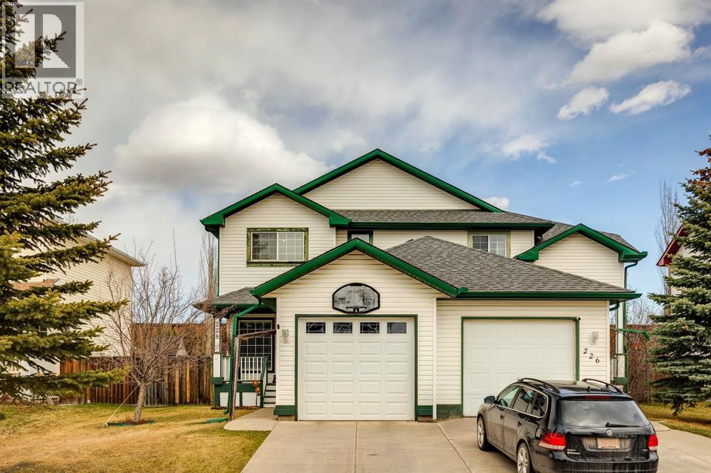 228 Quigley Drive, Cochrane, Alberta  T4C 1T3 - Photo 1 - A2306177