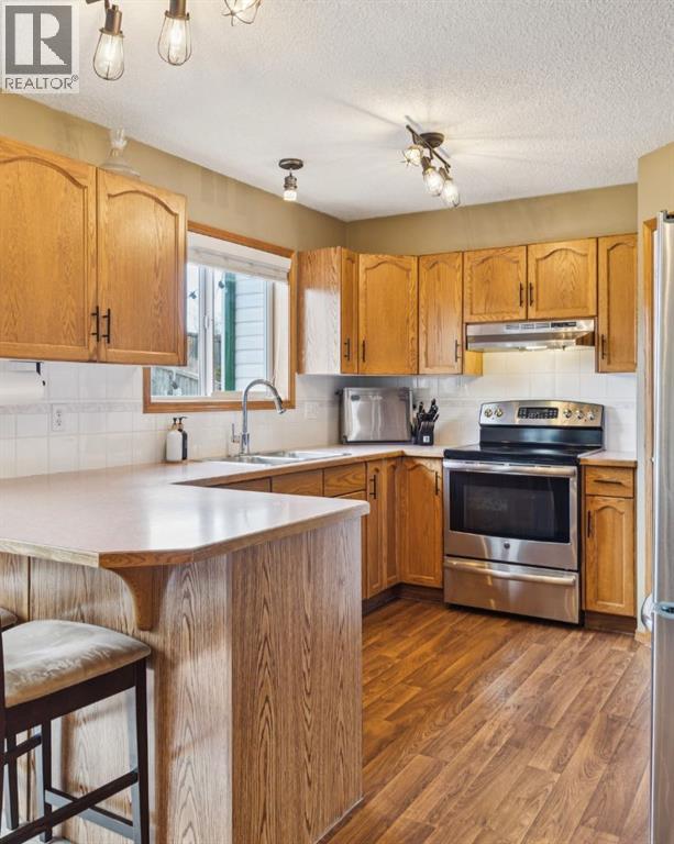 228 Quigley Drive, Cochrane, Alberta  T4C 1T3 - Photo 14 - A2306177
