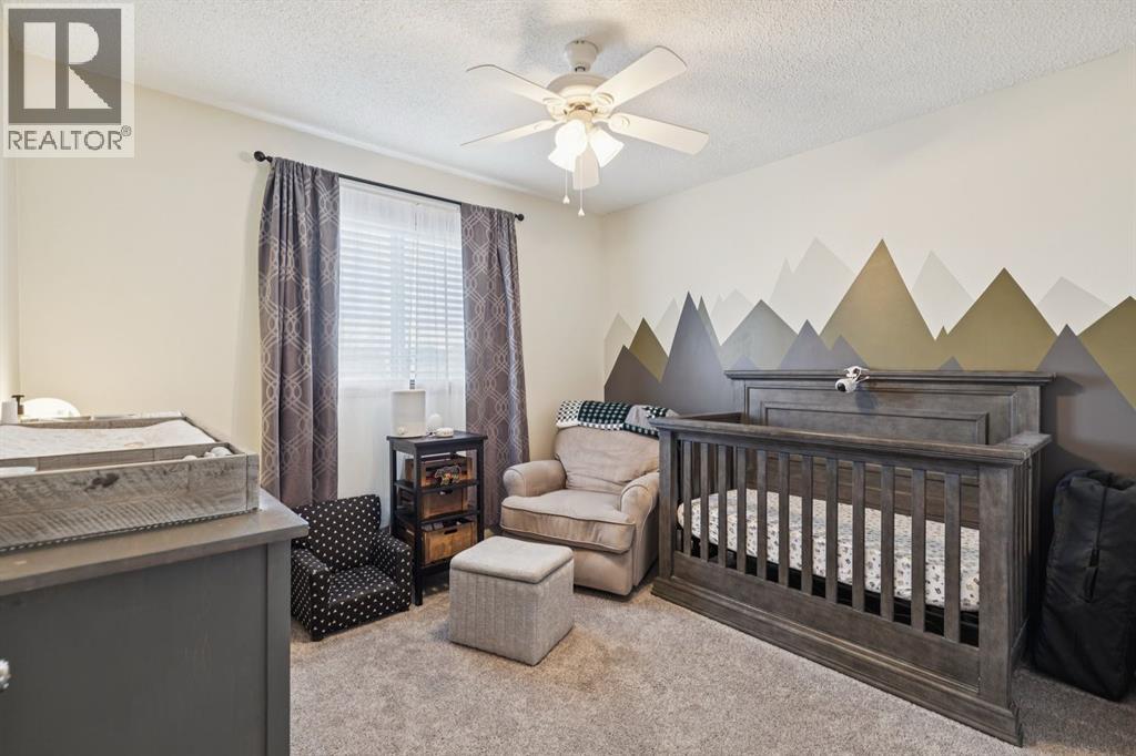 228 Quigley Drive, Cochrane, Alberta  T4C 1T3 - Photo 31 - A2306177