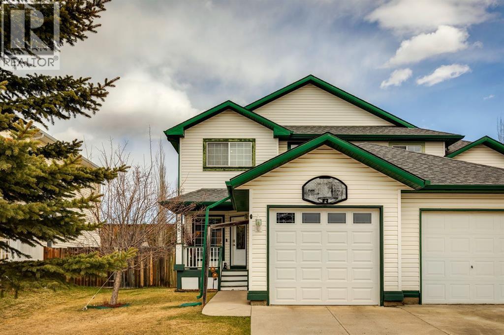 228 Quigley Drive, Cochrane, Alberta  T4C 1T3 - Photo 2 - A2306177