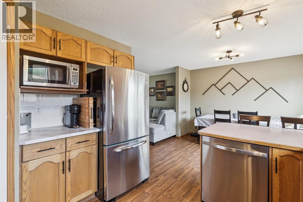 228 Quigley Drive, Cochrane, Alberta  T4C 1T3 - Photo 19 - A2306177