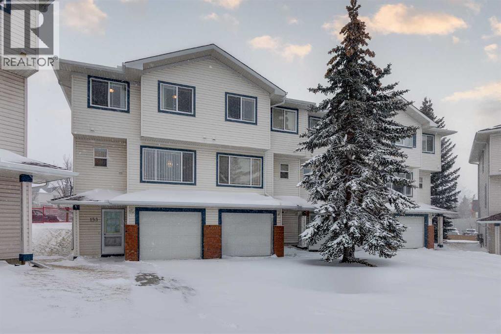 153 Rocky Ridge Court NW, Calgary, Alberta  T3G 4S7 - Photo 2 - A2287379
