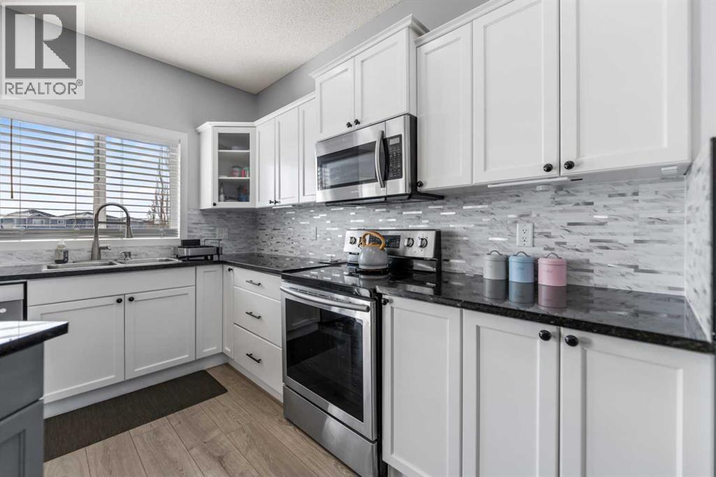 328 Rainbow  Falls Way, Chestermere, Alberta  T1X 1W5 - Photo 9 - A2303773