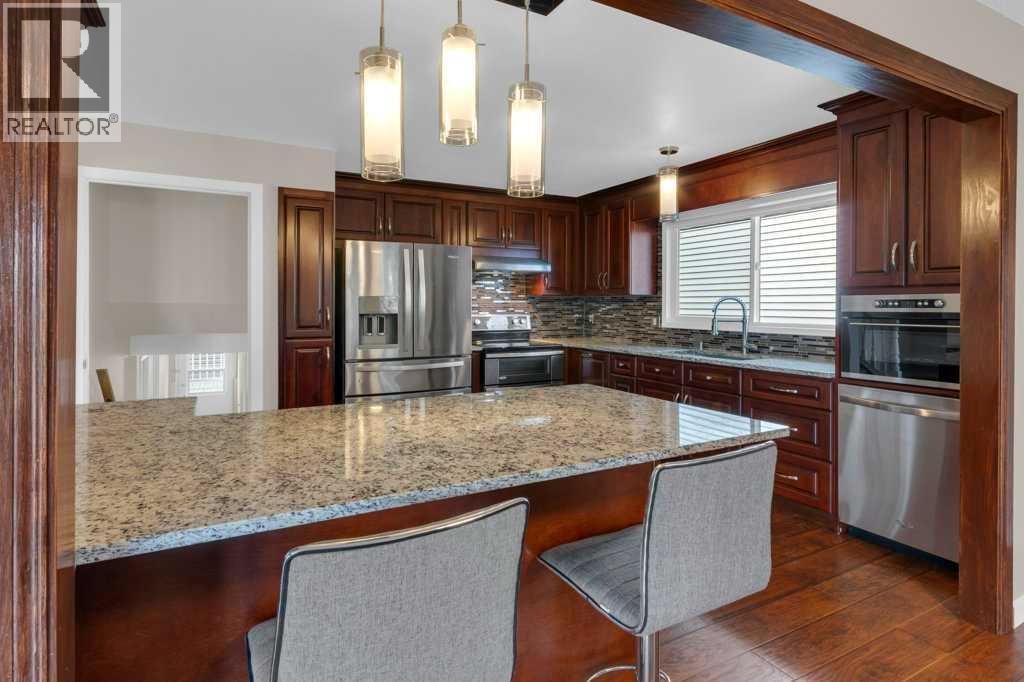 79 Scenic Way Nw, Calgary, Alberta  T3L 1B4 - Photo 30 - A2304539