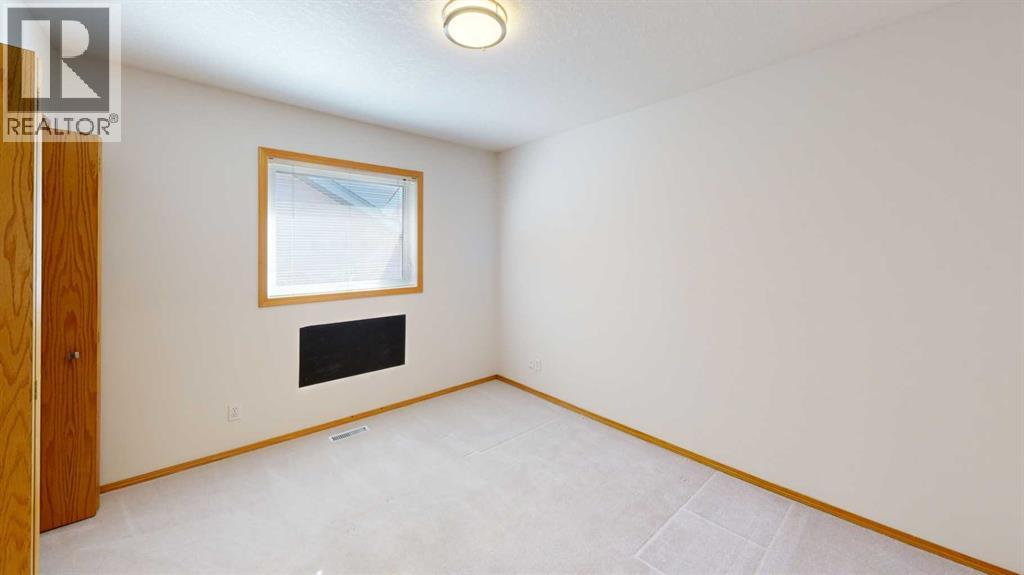 7 Mt Alderson Place W, Lethbridge, Alberta  T1K 6N7 - Photo 11 - A2306611