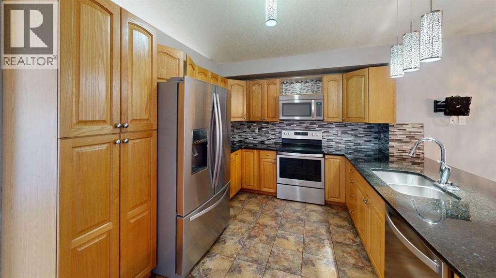 7 Mt Alderson Place W, Lethbridge, Alberta  T1K 6N7 - Photo 18 - A2306611