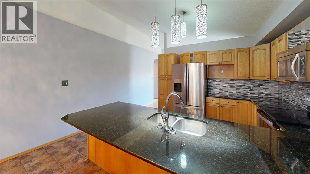 7 Mt Alderson Place W, Lethbridge, Alberta  T1K 6N7 - Photo 19 - A2306611