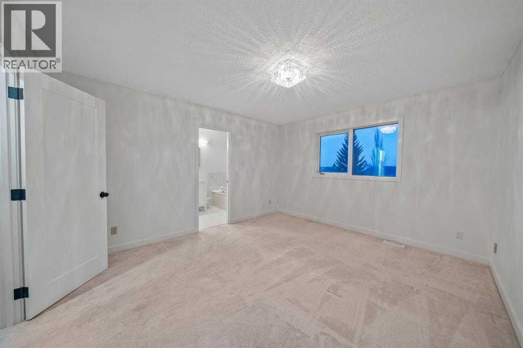 16 Sandringham Close NW, Calgary, Alberta  T3K 3W8 - Photo 22 - A2286563