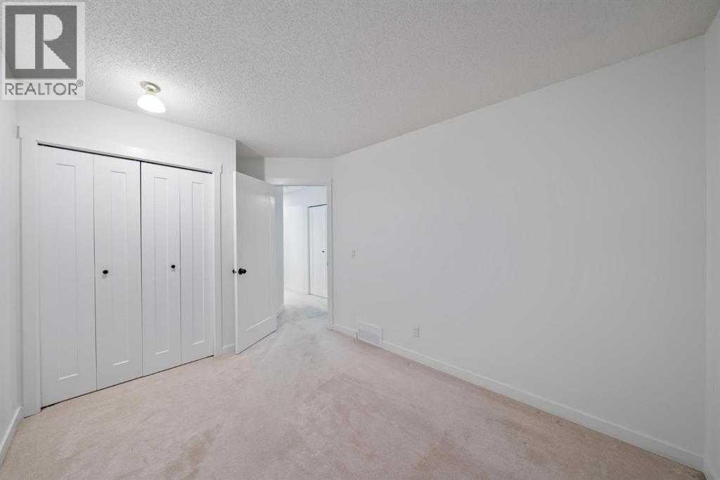 16 Sandringham Close NW, Calgary, Alberta  T3K 3W8 - Photo 26 - A2286563