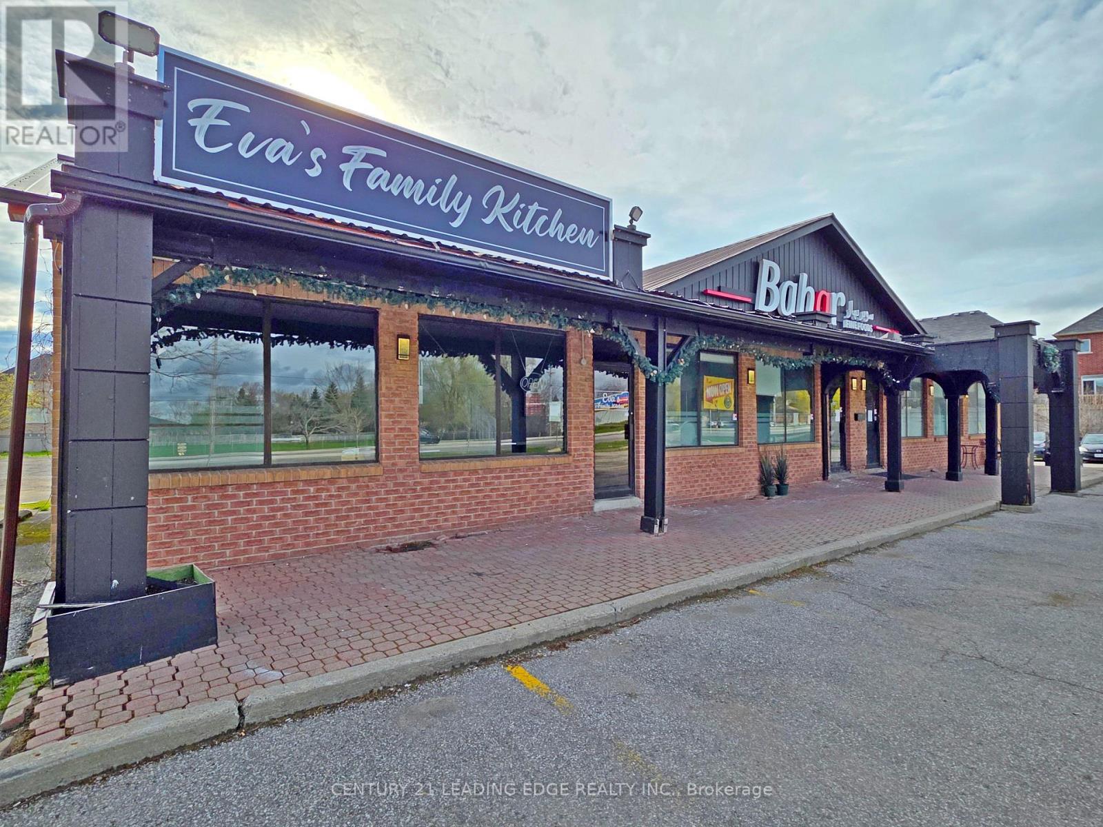 591 The Queensway South, Georgina, Ontario  L4P 2G3 - Photo 4 - N12852036