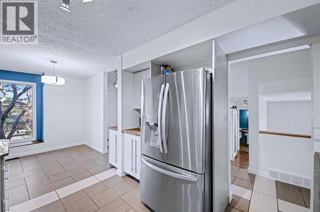 188 Bernard Drive Nw, Calgary, Alberta  T3K 2B7 - Photo 6 - A2287043