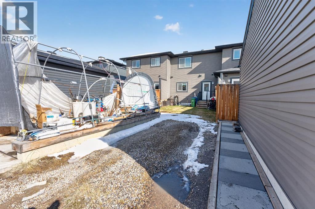 23 Belgian Link, Cochrane, Alberta  T4C 0M3 - Photo 35 - A2303290