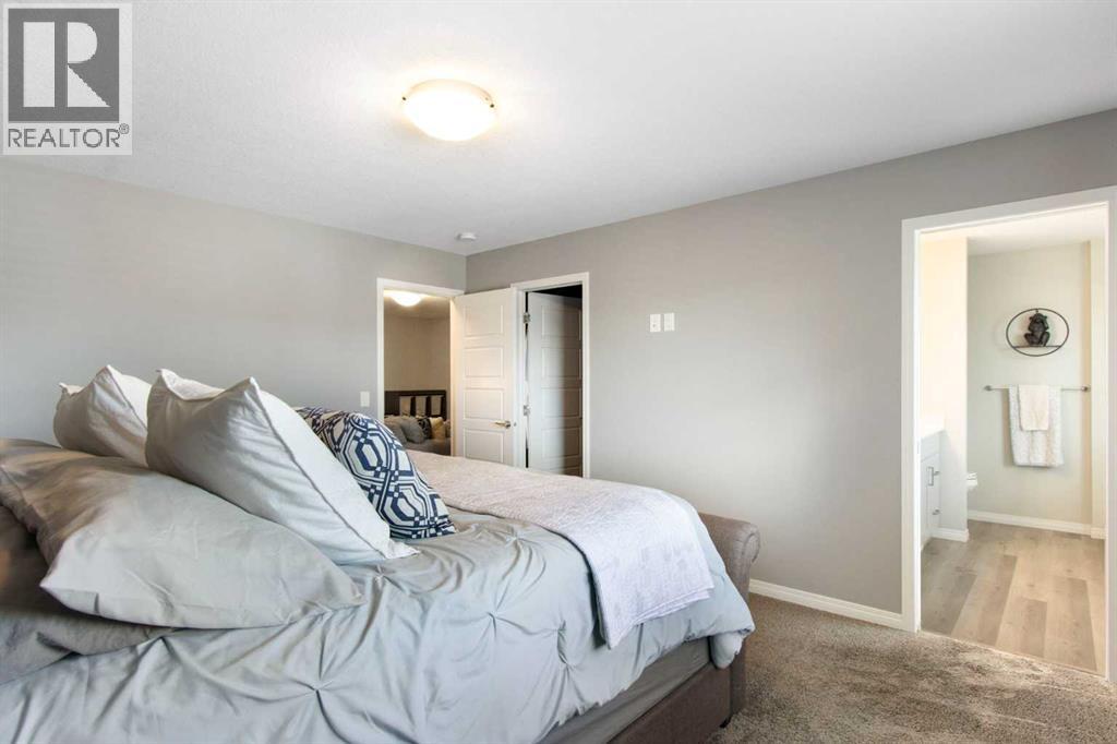 32 Wolf Creek Street SE, Calgary, Alberta  T2X 4V2 - Photo 21 - A2306273