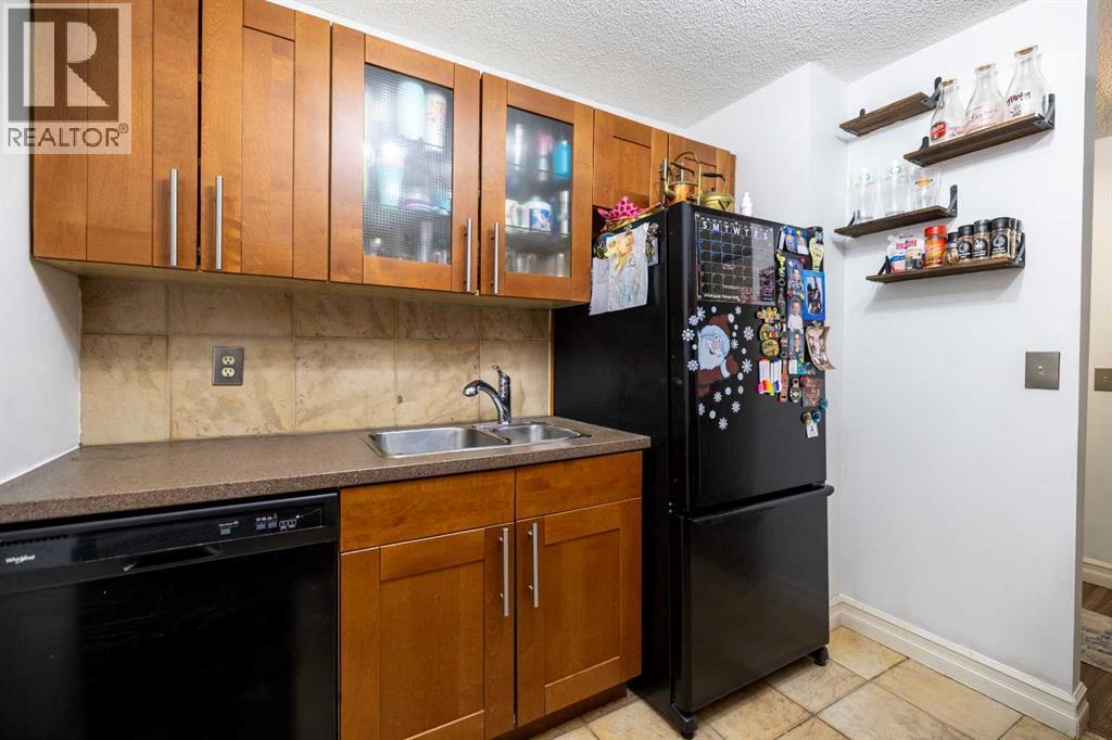 208, 4944 Dalton Drive NW, Calgary, Alberta  T3A 2E6 - Photo 11 - A2272072