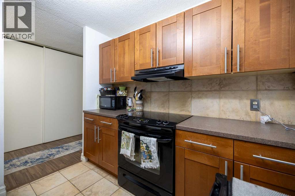 208, 4944 Dalton Drive NW, Calgary, Alberta  T3A 2E6 - Photo 12 - A2272072