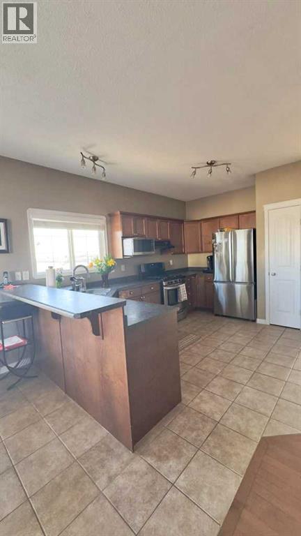 10201 Landing Drive Drive, Grande Prairie, Alberta  T8X 0B5 - Photo 5 - A2305407