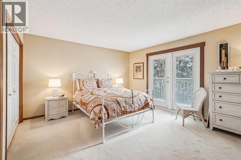 27 Woodacres Way SW, Calgary, Alberta  T2W 4W2 - Photo 21 - A2295259