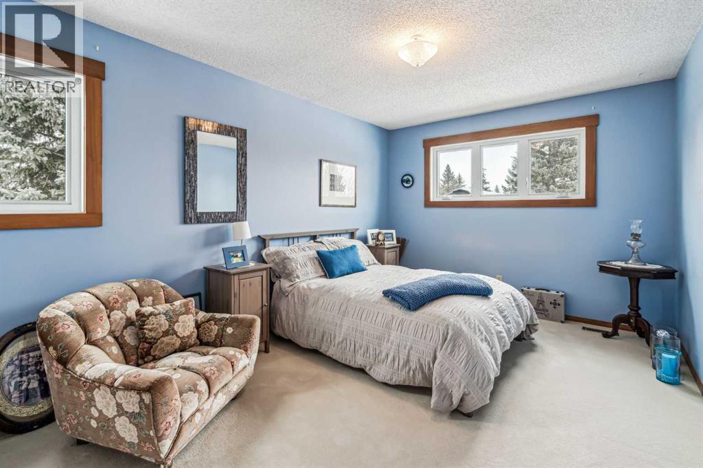 27 Woodacres Way SW, Calgary, Alberta  T2W 4W2 - Photo 26 - A2295259