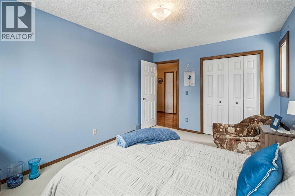 27 Woodacres Way SW, Calgary, Alberta  T2W 4W2 - Photo 27 - A2295259