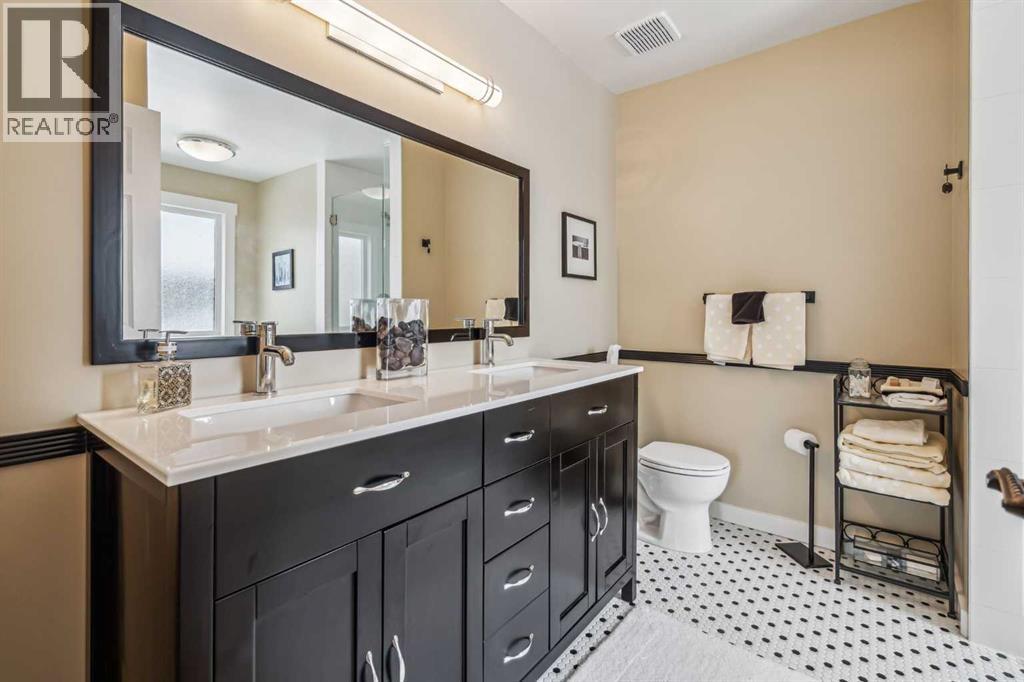 27 Woodacres Way SW, Calgary, Alberta  T2W 4W2 - Photo 24 - A2295259