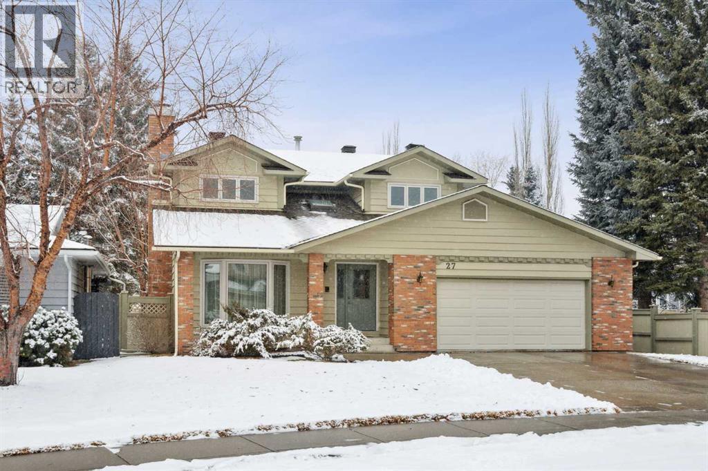 27 Woodacres Way SW, Calgary, Alberta  T2W 4W2 - Photo 1 - A2295259