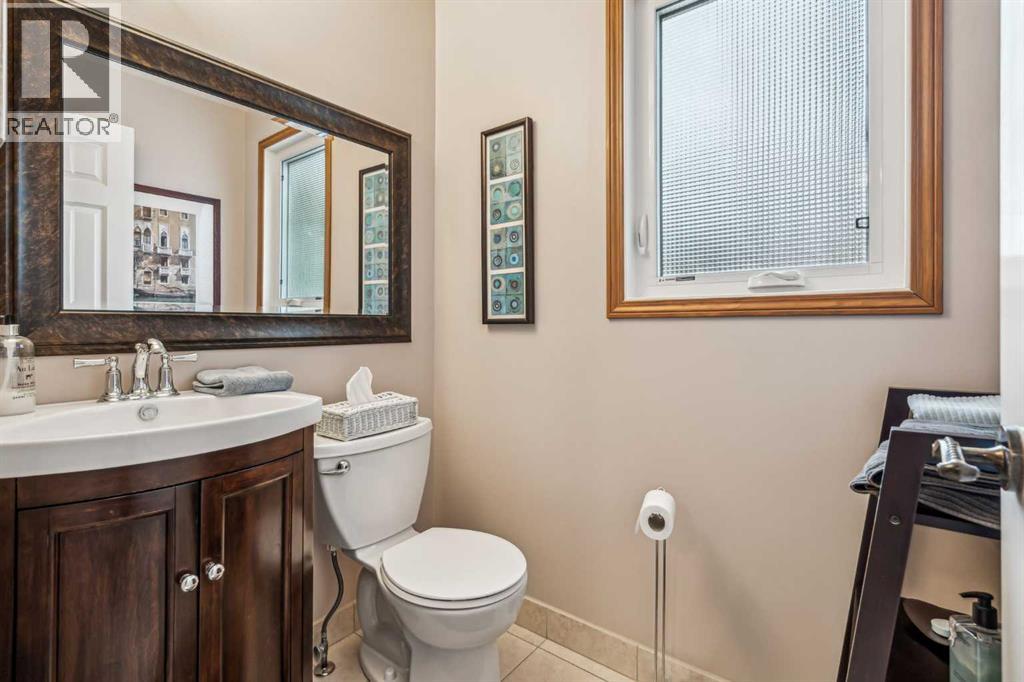 27 Woodacres Way SW, Calgary, Alberta  T2W 4W2 - Photo 19 - A2295259
