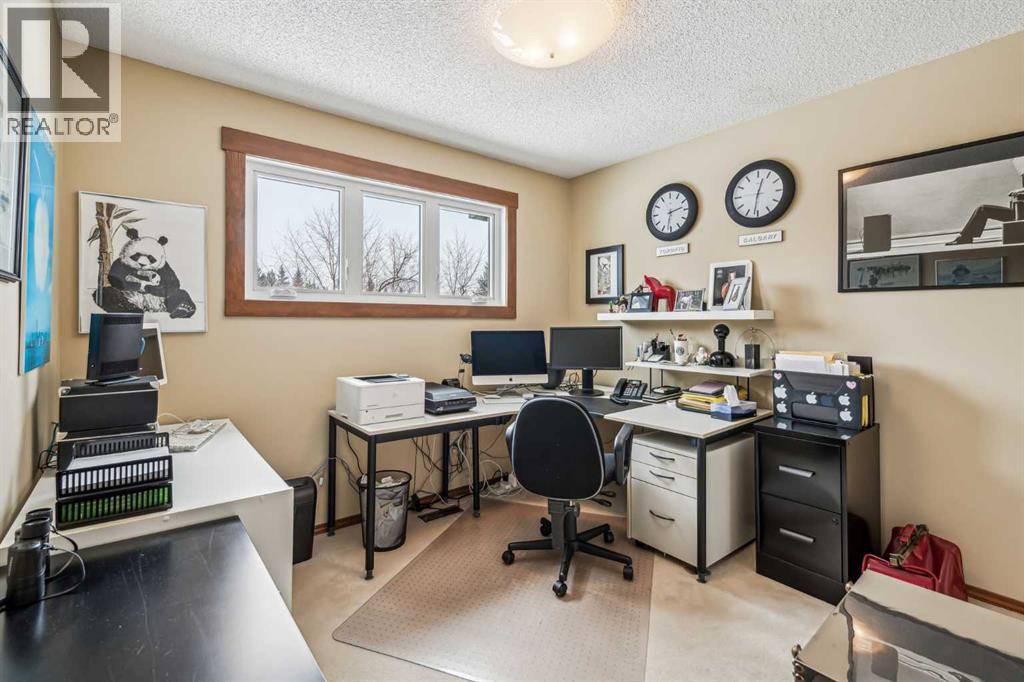 27 Woodacres Way SW, Calgary, Alberta  T2W 4W2 - Photo 31 - A2295259