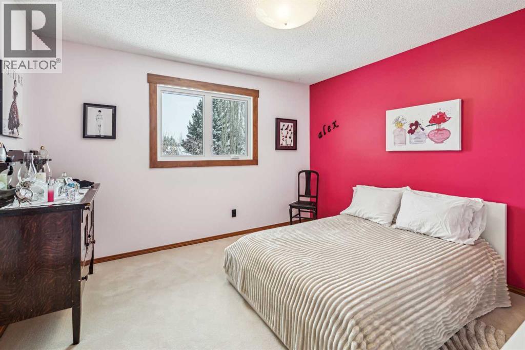 27 Woodacres Way SW, Calgary, Alberta  T2W 4W2 - Photo 28 - A2295259