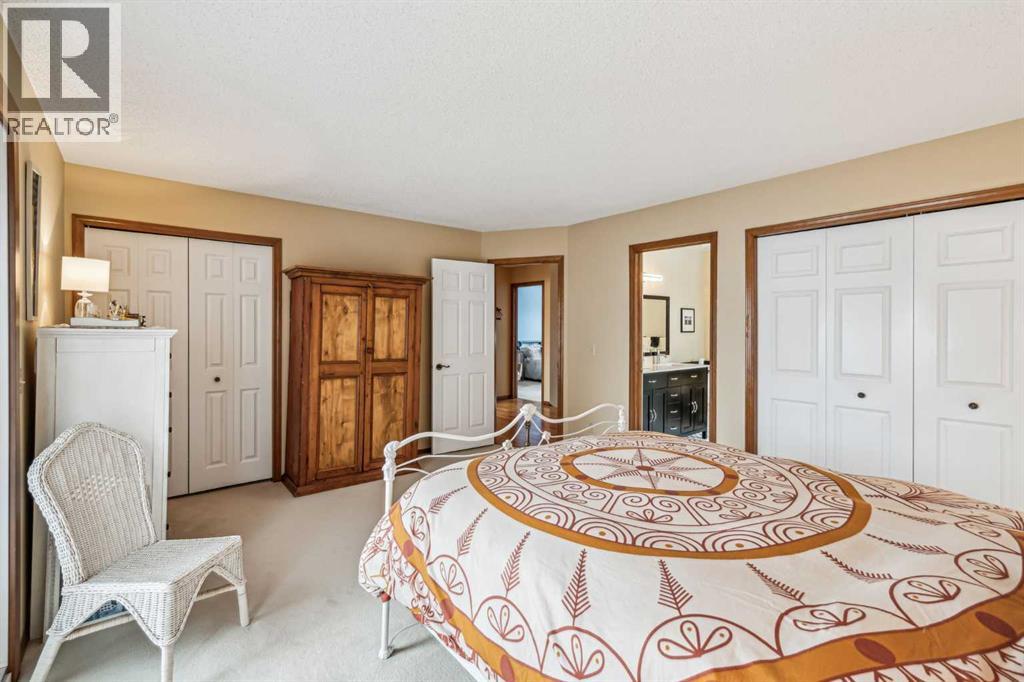 27 Woodacres Way SW, Calgary, Alberta  T2W 4W2 - Photo 22 - A2295259