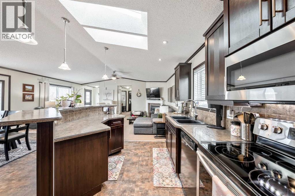 4 Spring Dale Circle Se, Airdrie, Alberta  T4A 1N8 - Photo 7 - A2301953