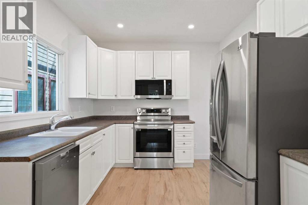 739 19 Avenue Nw, Calgary, Alberta  T2M 0Z2 - Photo 6 - A2277179