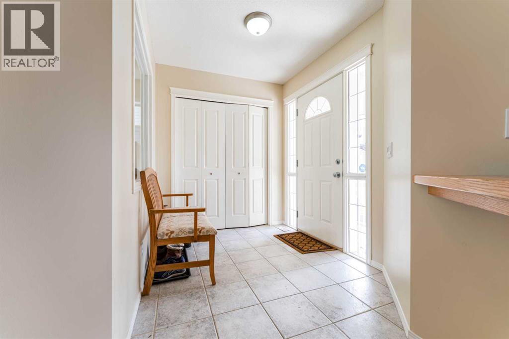 93 Tuscany Meadows Place Nw, Calgary, Alberta  T3L 2S1 - Photo 6 - A2306016