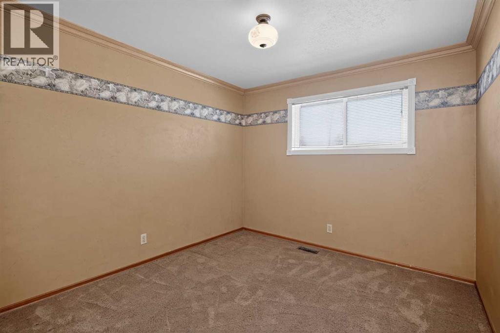 67 Woodstock Road Sw, Calgary, Alberta  T2W 5W3 - Photo 26 - A2304479
