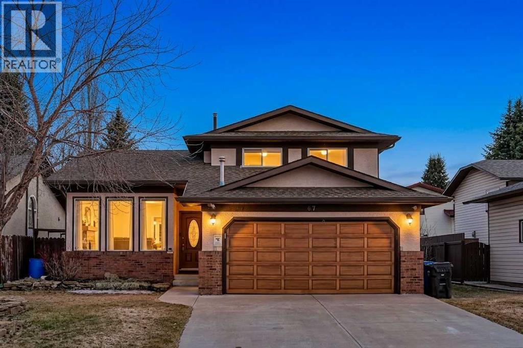 67 Woodstock Road Sw, Calgary, Alberta  T2W 5W3 - Photo 1 - A2304479
